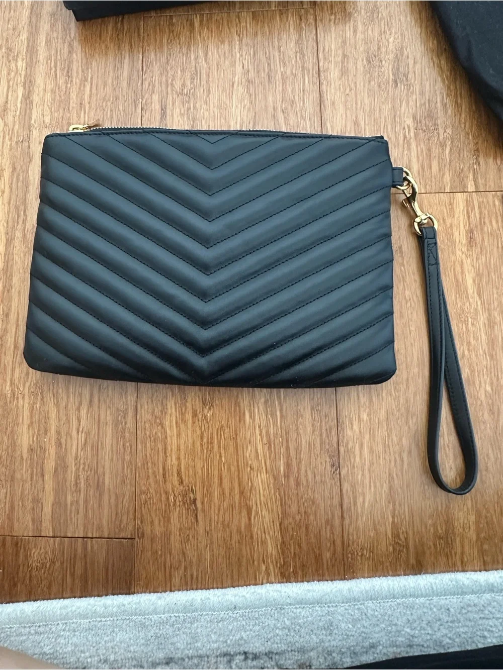 Saint Laurent Black Quilted Leather Wristlet with Gold YSL Emblem
